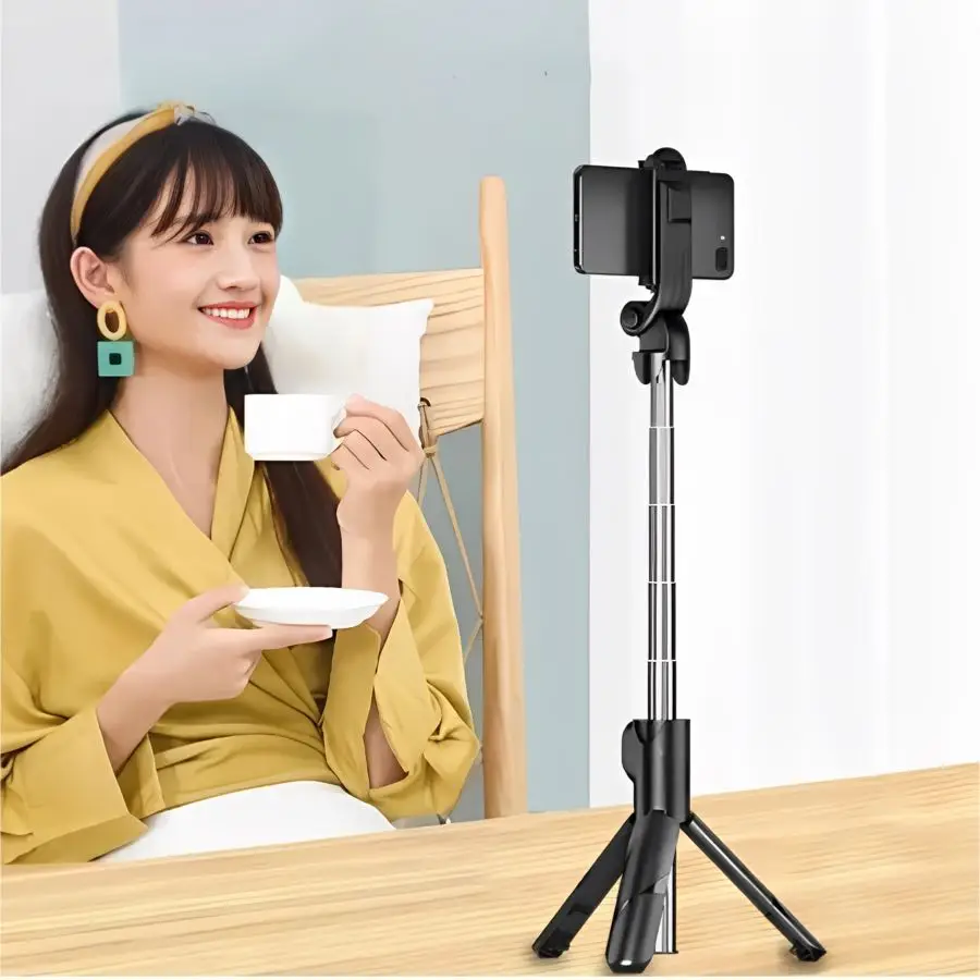 Bastão de selfie usado como tripé de mesa